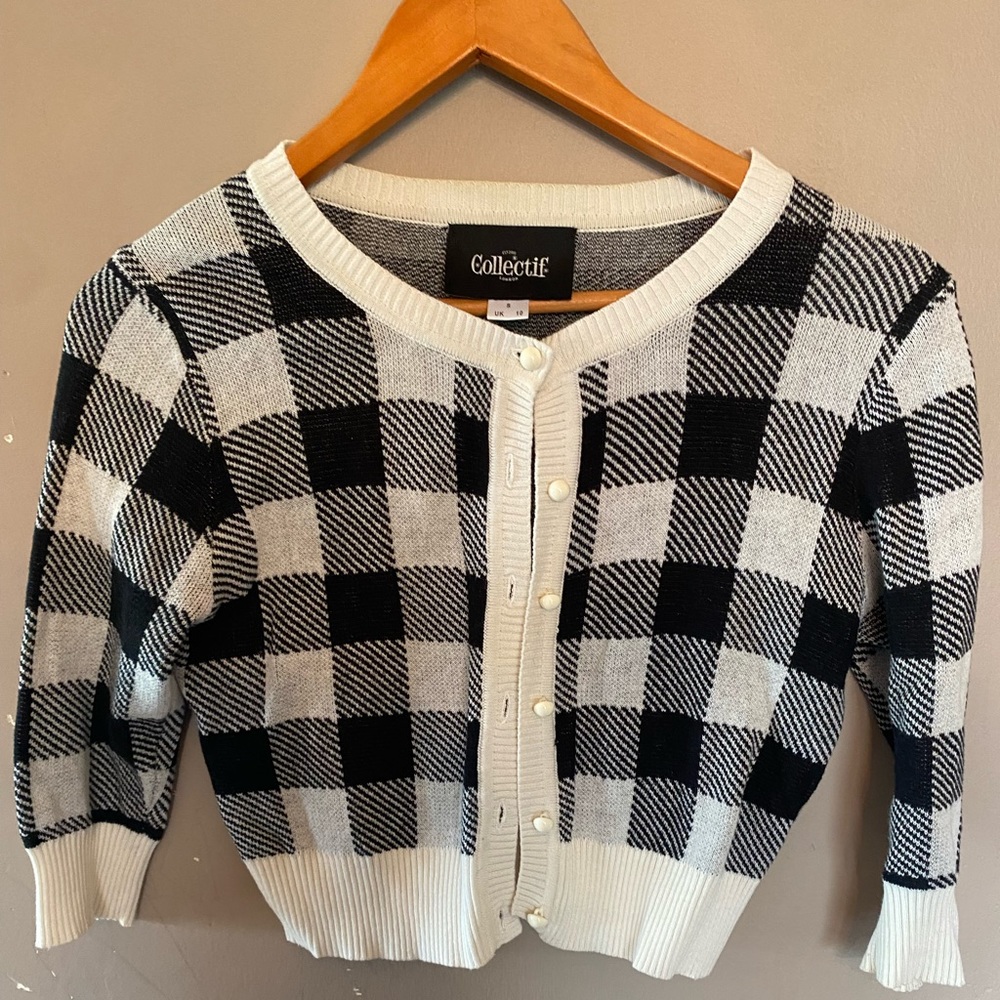 Collectif elbow length button up sweater in black and white plaid design